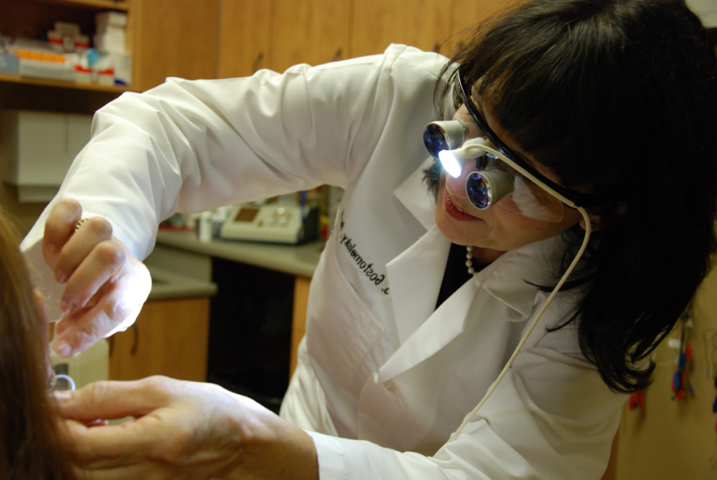 Dr. Gostomelsky with patient at the Audiology Associates of Deerfield office