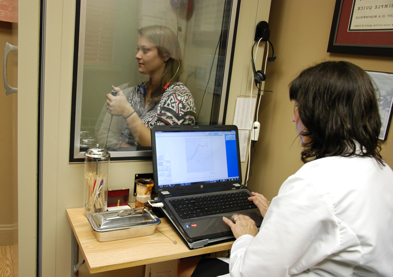Dr. Gostomelsky doing a hearing evaulation for patient at Audiology Associates of Deerfield