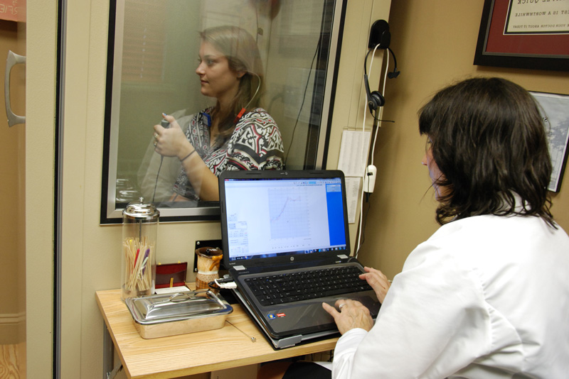 Dr. Gostomelsky doing a hearing evaulation for patient at Audiology Associates of Deerfield